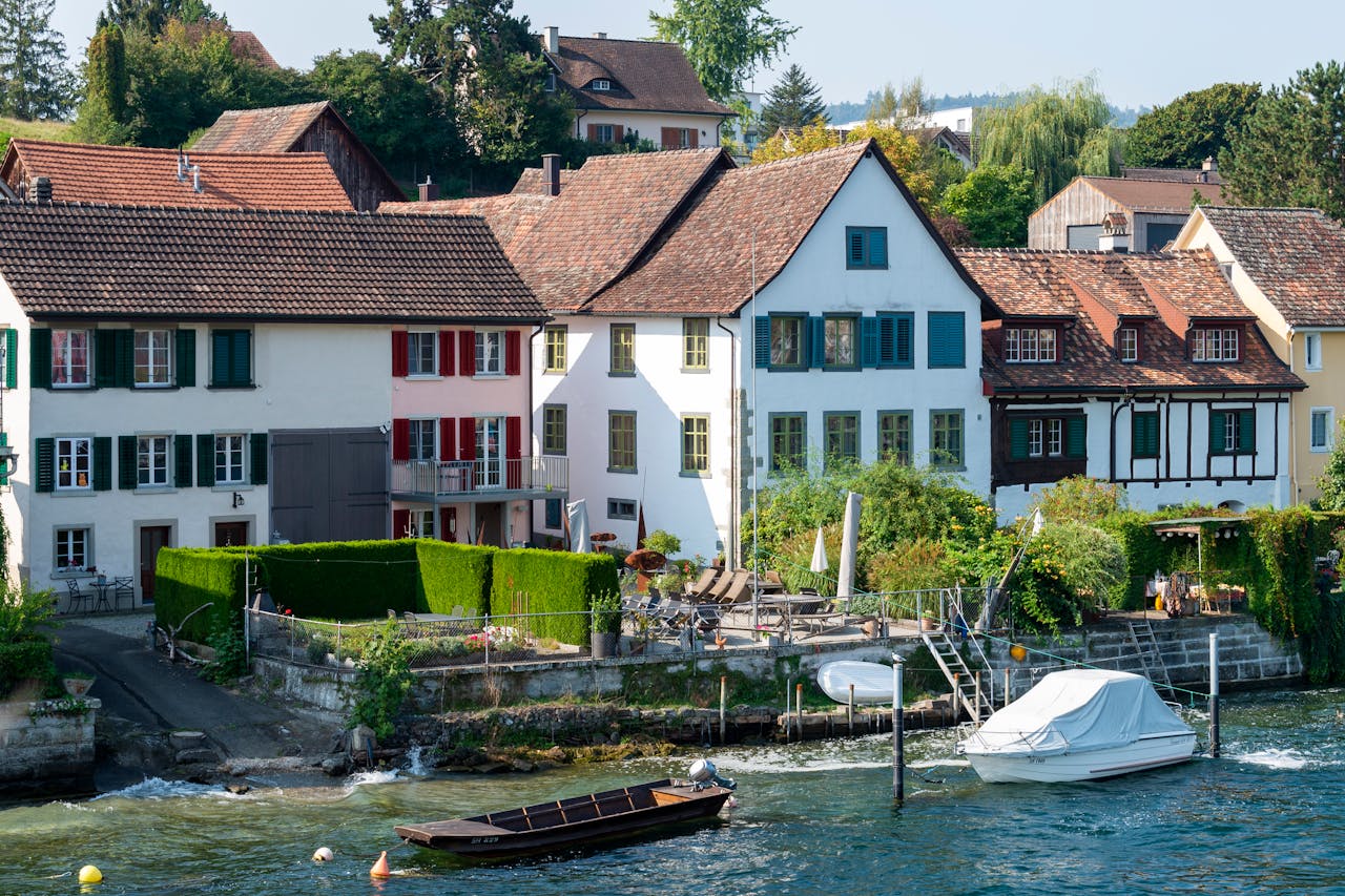 Picturesque view of charming riverside houses in Stein am Rhein, Switzerland on a sunny day.