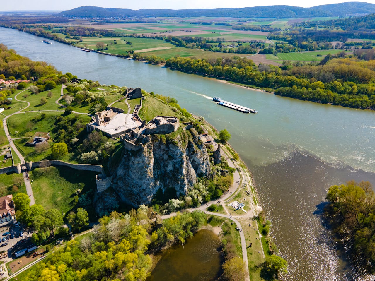 get-in-touch Spectacular aerial shot of Devín Castle overlooking the Danube River near Bratislava, Slovakia.